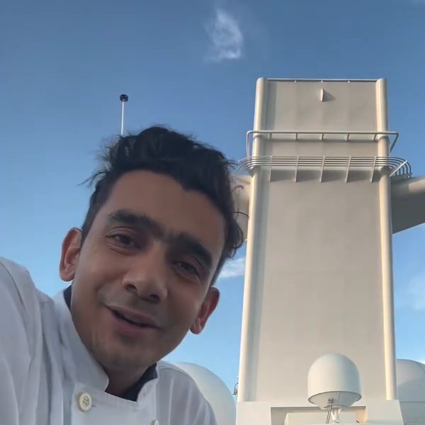 Nitin on the top deck of his ship, by the funnel